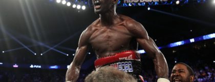 Terence Crawford celebrates a victory in the ring