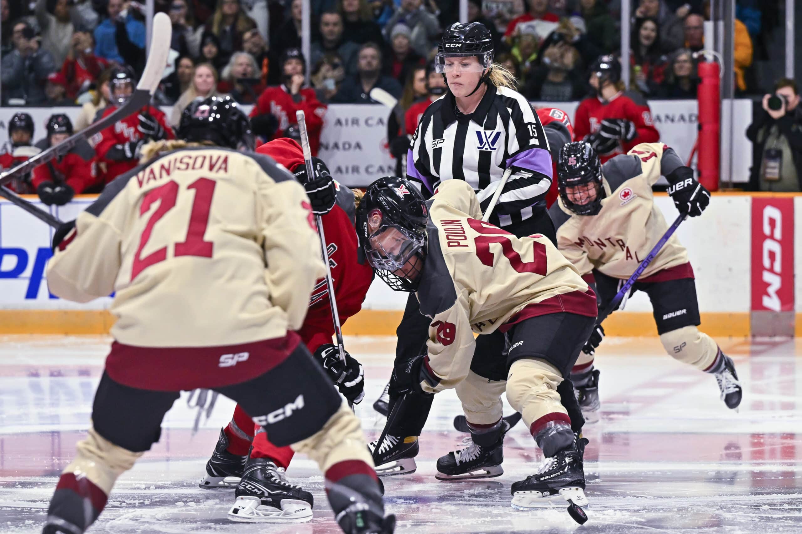 Hayley Scamurra #14 of Ottawa and Marie-Philip Poulin #29 of Montreal take the opening faceoff during the first period of a Professional Women's Hockey League (PWHL) game at The Arena at TD Place.