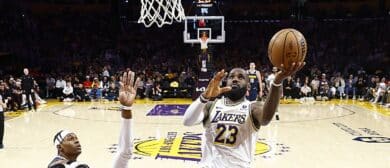 LeBron James #23 of the Los Angeles Lakers takes a shot against the Denver Nuggets in the first half during game four of the Western Conference First Round Playoffs at Crypto.com Arena on April 27, 2024 in Los Angeles, California