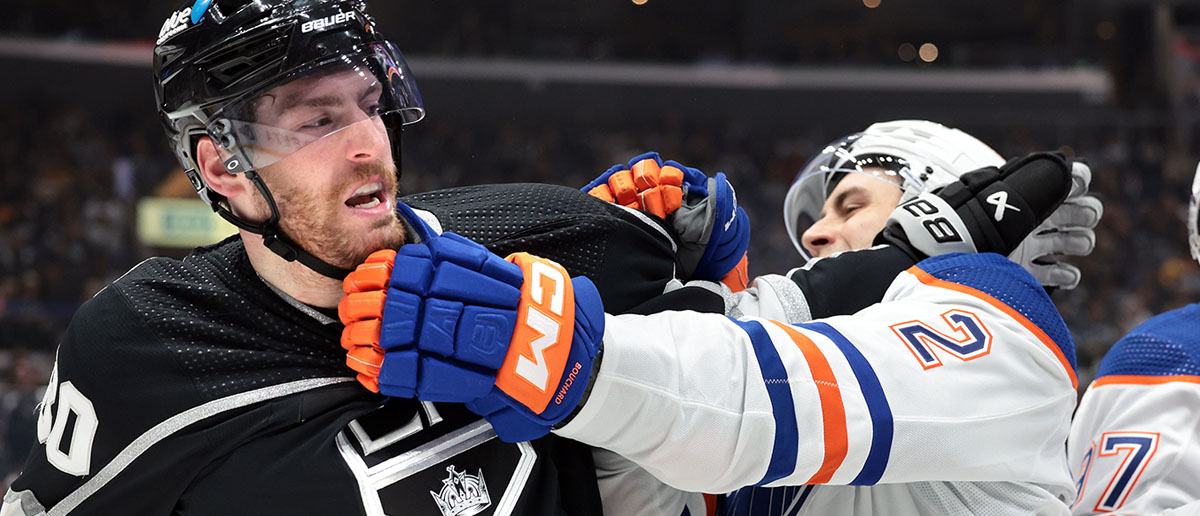 Kings Pierre-Luc Dubois roughs it up with Oilers Evan Bouchard in the in the third period in game 3 of the first round of the Stanley Cup Finals. (Oilers Predictions)