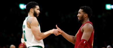Boston Celtics SF Jayson Tatum and Cleveland Cavaliers SG Donovan Mitchell shakes hands after the game. The Celtics beat the Cavaliers, 116-107.