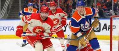 Corey Perry #90 of the Edmonton Oilers and Nazem Kadri #91 of the Calgary Flames track the play in the second period on FEBRUARY 24, 2024 at Rogers Place in Edmonton, Alberta, Canada.