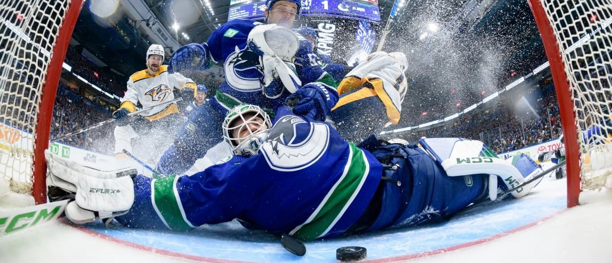 Roman Josi #59 of the Nashville Predators scores a goal on Arturs Silovs #31 as Teddy Blueger #53 of the Vancouver Canucks looks on during the third period in Game Five of the First Round of the 2024 Stanley Cup Playoffs at Rogers Arena on April 30, 2024 in Vancouver, British Columbia, Canada