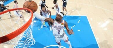 Shai Gilgeous-Alexander #2 of the Oklahoma City Thunder rebounds the ball during the game against the Dallas Mavericks during Round 2 Game 1 of the 2024 NBA Playoffs on May 7, 2024 at Paycom Arena in Oklahoma City, Oklahoma.