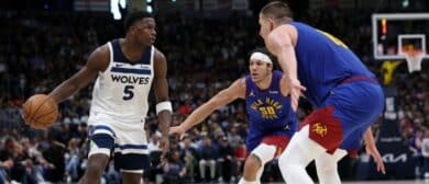 Anthony Edwards #5 of the Minnesota Timberwolves drives against Aaron Gordon #50 and Nikola Jokic #15 of the Denver Nuggets in the third quarter during Game One of the Western Conference Second Round Playoffs at Ball Arena on May 04, 2024 in Denver, Colorado.