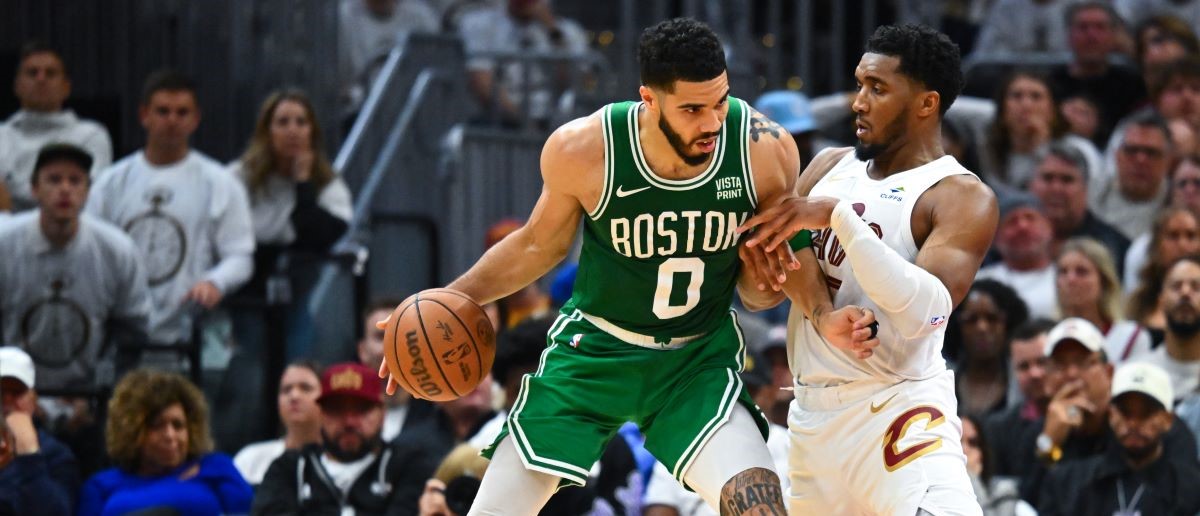 Jayson Tatum #0 of the Boston Celtics drives to the basket against Donovan Mitchell #45 of the Cleveland Cavaliers during the fourth quarter in Game Three of the Eastern Conference Second Round Playoffs at Rocket Mortgage Fieldhouse on May 11, 2024 in Cleveland, Ohio.