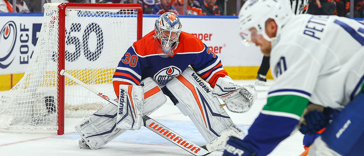 Calvin Pickard of the Edmonton Oilers squares up against Elias Pettersson in Game 3 of the series (Canucks/Oilers predictions)