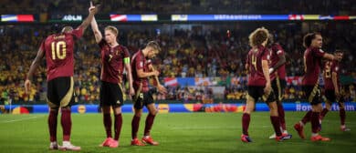 Romelu Lukaku of Belgium celebrates scoring a goal with teammate Kevin De Bruyne which was later ruled out for offside following a VAR review during the UEFA EURO 2024 group stage match between Belgium and Romania at Cologne Stadium on June 22, 2024 in Cologne, Germany.