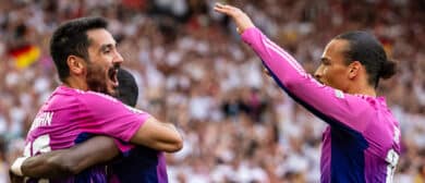 Ilkay Guendogan of Germany celebrates with teammates Antonio Ruediger of Germany and Leroy Sane of Germany after scoring his team's second goal during the UEFA EURO 2024 group stage match between Germany and Hungary at Stuttgart Arena on June 19, 2024 in Stuttgart, Germany.