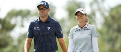 Corey Conners of Canada and Brooke M. Henderson of Canada walk from the second tee during the second round of the Grant Thornton Invitational at Tiburon Golf Club on December 09, 2023 in Naples, Florida.