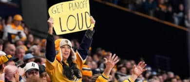 Nashville Predators fans cheer on their team during an NHL game against the St. Louis Blues at Bridgestone Arena on April 4, 2024 in Nashville, Tennessee.
