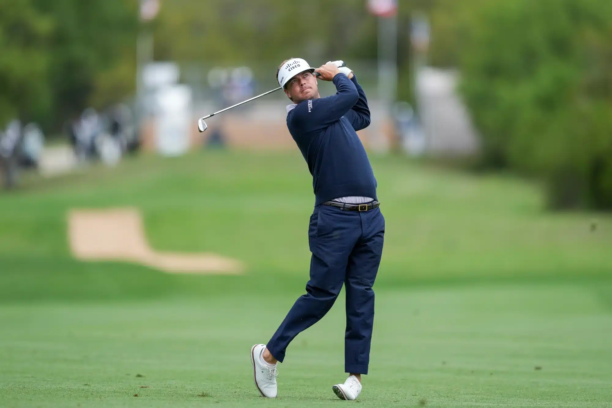 Apr 5, 2025; San Antonio, Texas, USA; Keith Mitchell watches his shot on the first hole during the third round of the Valero Texas Open golf tournament.