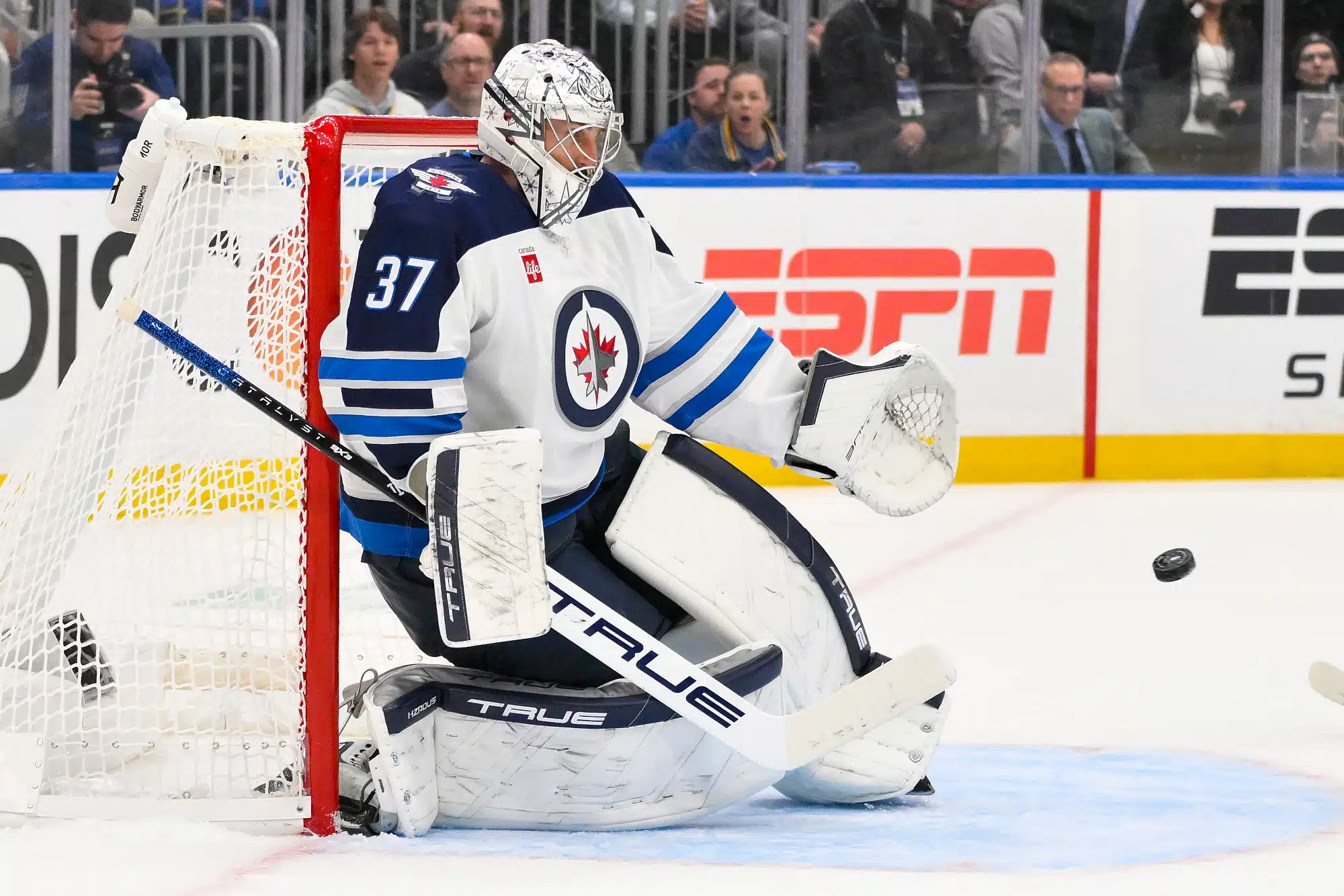 Apr 24, 2025; St. Louis, Missouri, USA; Winnipeg Jets goaltender Connor Hellebuyck (37) defends the net against the St. Louis Blues during the second period in game three of the first round of the 2025 Stanley Cup Playoffs at Enterprise Center. 