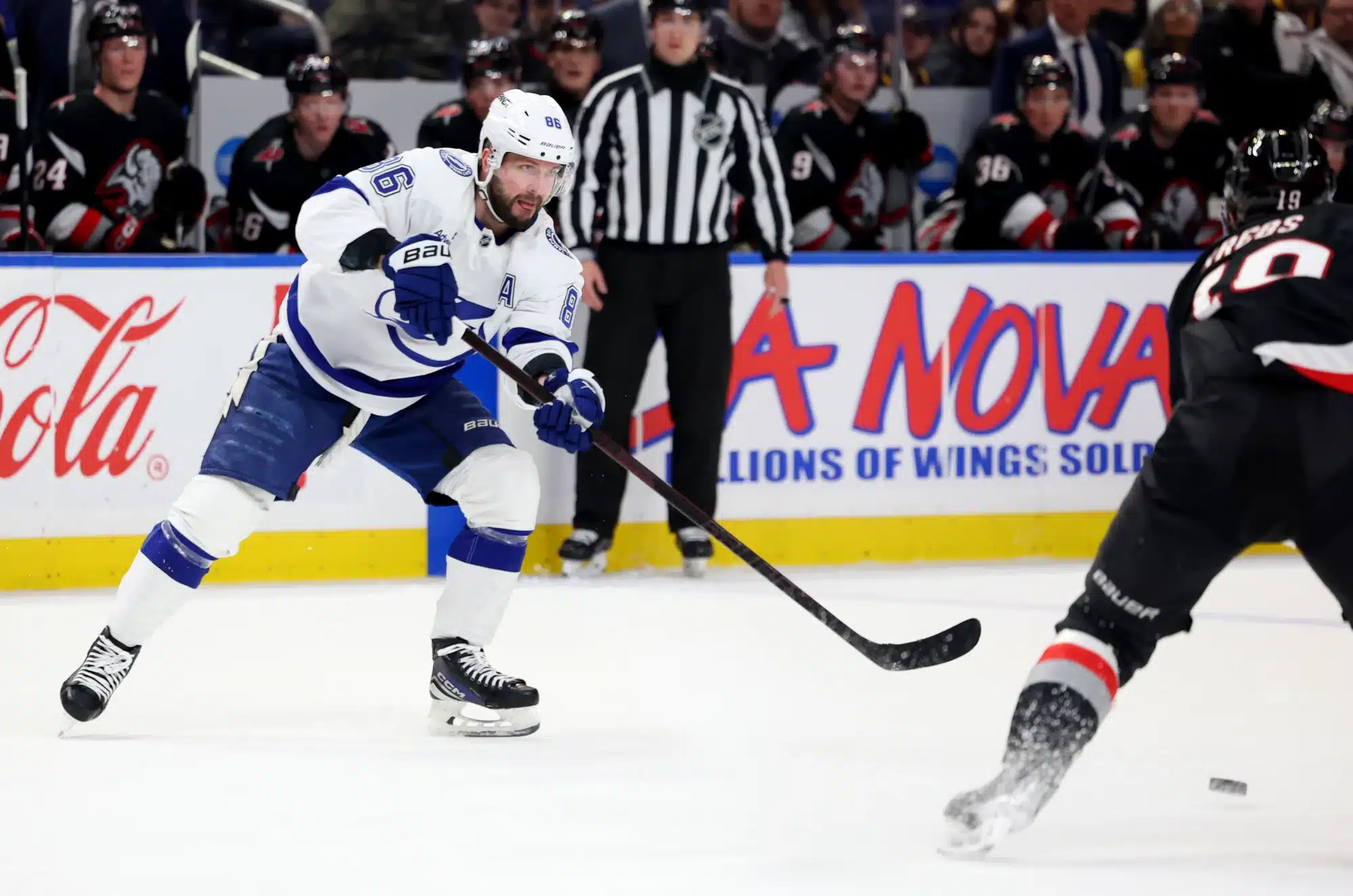 Apr 5, 2025; Buffalo, New York, USA; Tampa Bay Lightning right wing Nikita Kucherov (86) makes a pass during the first period against the Buffalo Sabres at KeyBank Center.