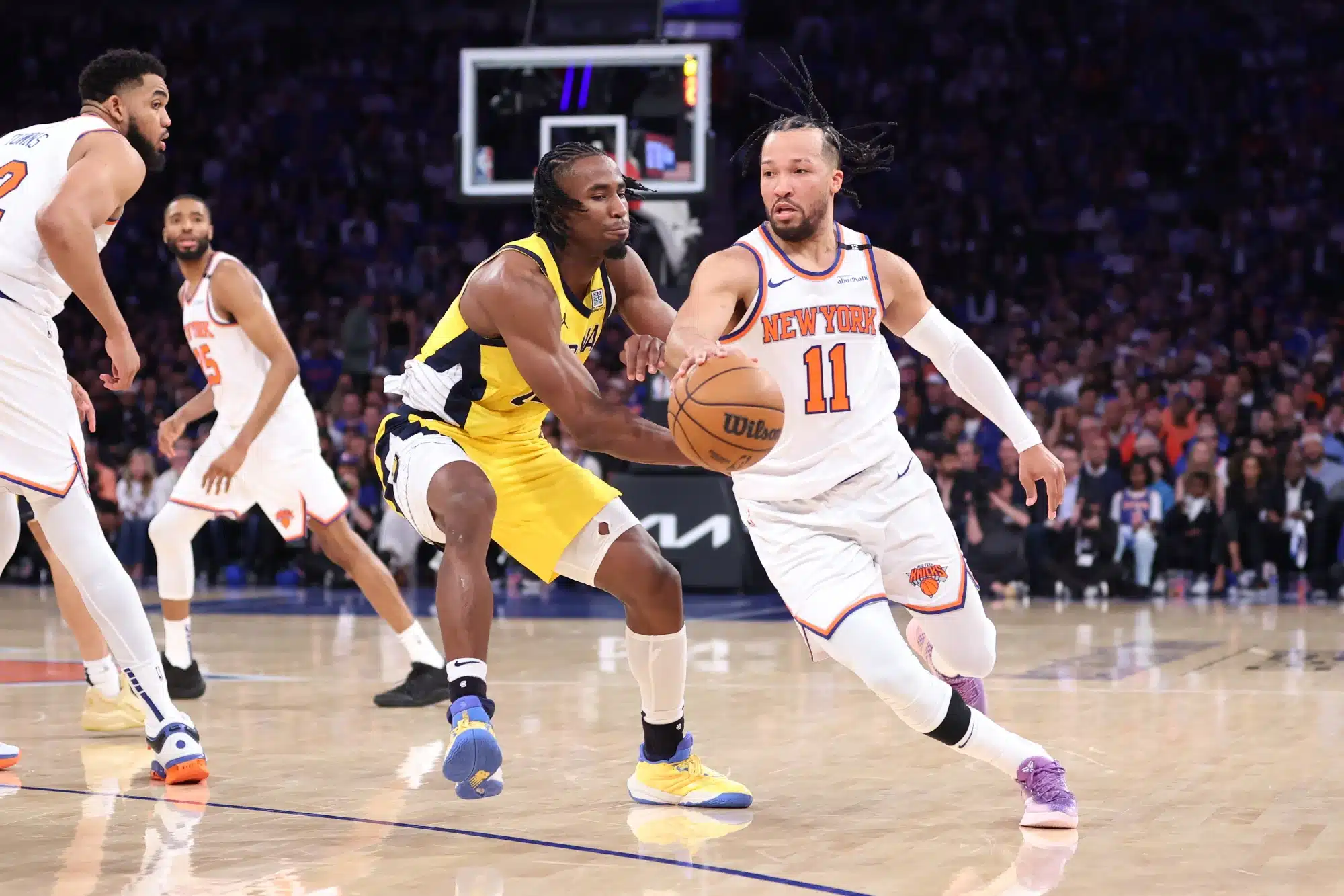 May 21, 2025; New York, New York, USA; New York Knicks guard Jalen Brunson (11) controls the ball against Indiana Pacers forward Aaron Nesmith (23) in the third quarter during game one of the eastern conference finals for the 2025 NBA Playoffs at Madison Square Garden.