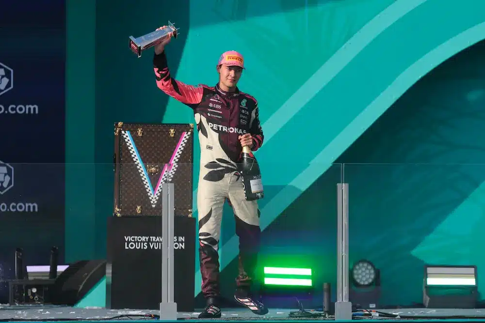 May 4, 2025; Miami Gardens, FL, USA; Mercedes driver George Russell (63) celebrates at the podium after finishing third during the F1 Miami Grand Prix at Miami International Autodrome.