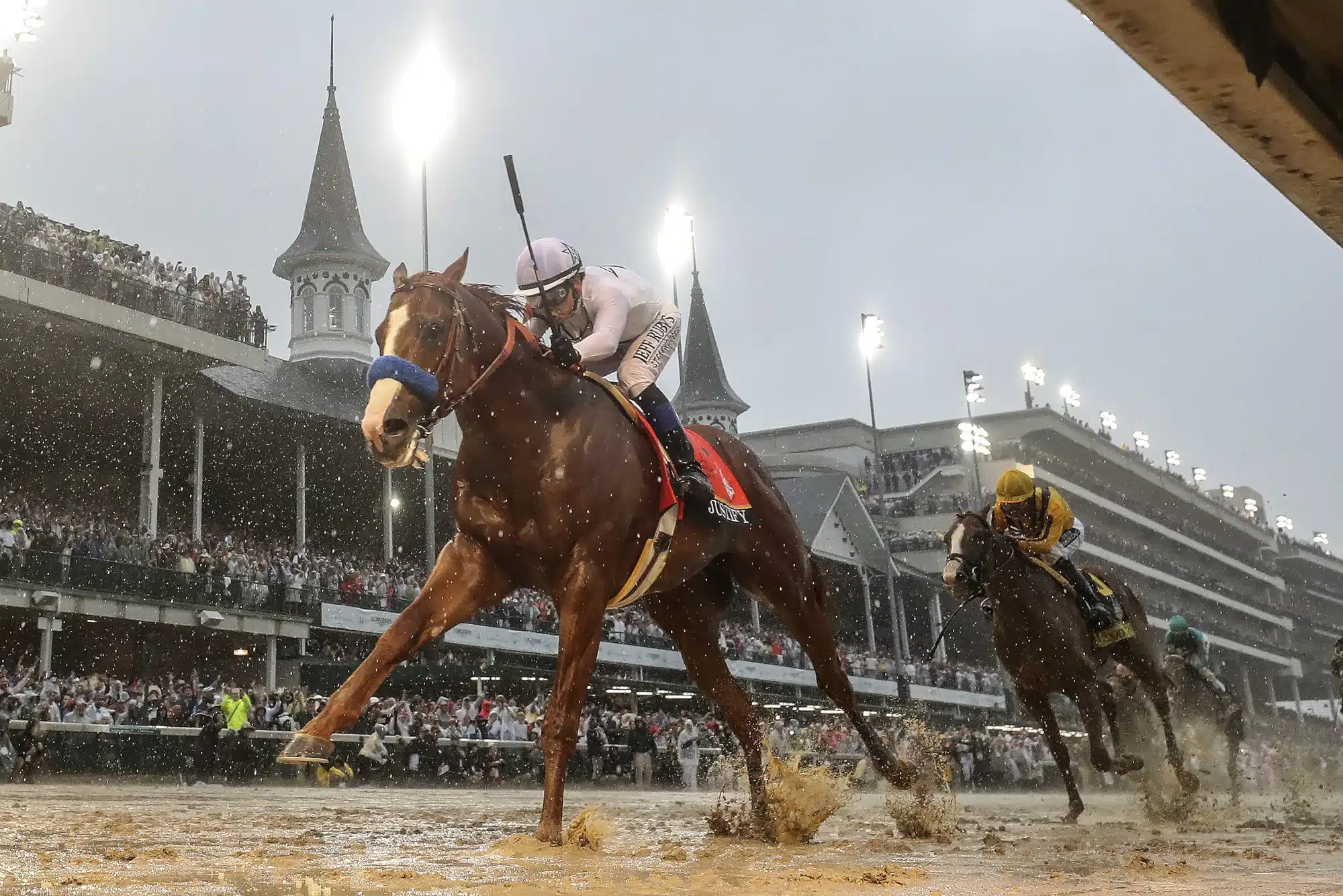 Justify, with Mike Smith aboard, wins the 144th running of the Kentucky Derby at Churchill Downs in 2018.