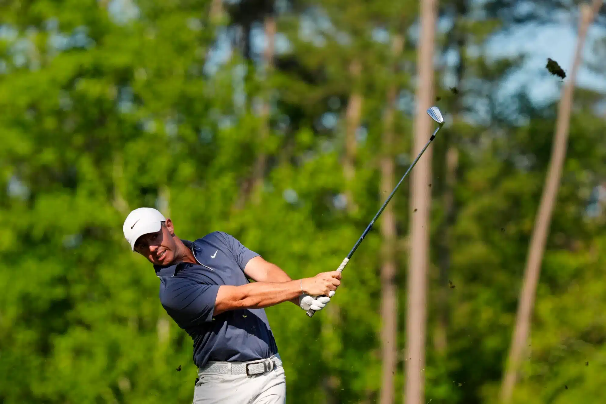 Apr 13, 2025; Augusta, Georgia, USA; Rory McIlroy plays his shot from the 12th tee during the final round of the Masters Tournament at Augusta National Golf Club.