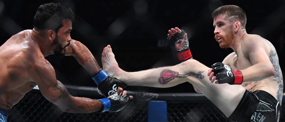 Cory Sandhagen (red gloves) fights Rob Font (blue gloves) during UFC Fight Night at Bridgestone Arena.