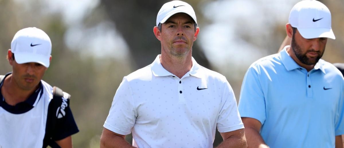 Rory McIlroy walks next to Scottie Scheffler on the ninth fairway during the second round of The Players Championship PGA golf tournment Friday, March 14, 2025 at TPC Sawgrass in Ponte Vedra Beach, Fla.