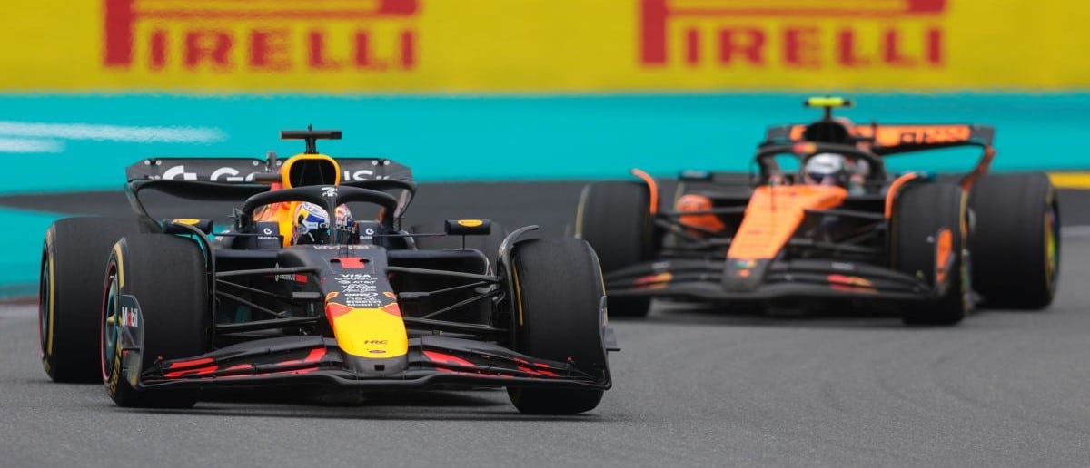 Red Bull driver Max Verstappen (1) races ahead of McLaren driver Lando Norris (4) during the F1 Miami Grand Prix at Miami International Autodrome