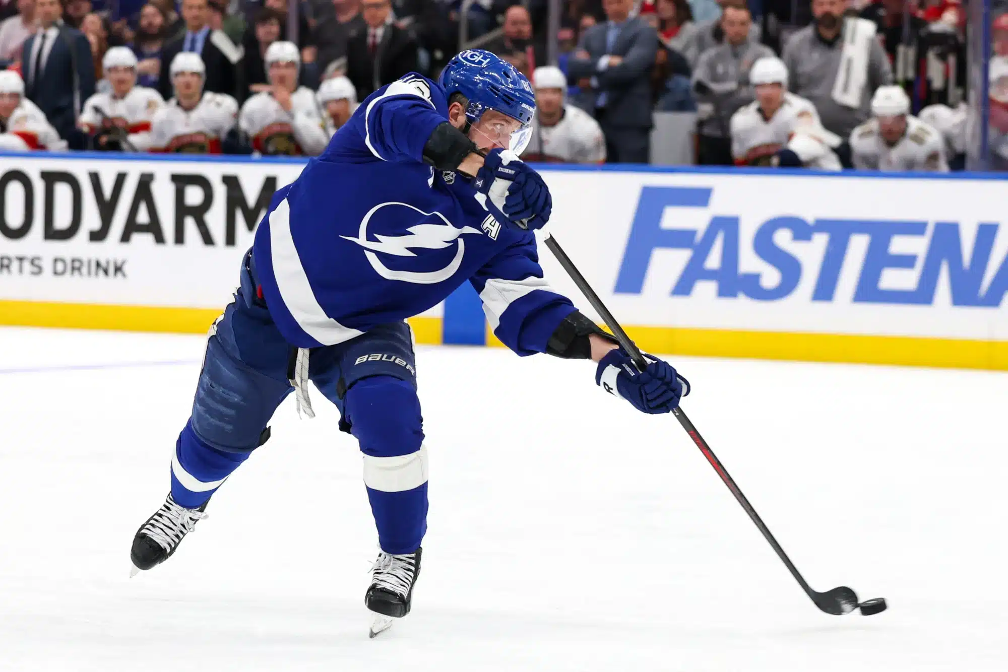 Apr 24, 2025; Tampa, Florida, USA;Tampa Bay Lightning right wing Nikita Kucherov (86) shoots the puck against the Florida Panthers during the first period in game two of the first round of the 2025 Stanley Cup Playoffs at Amalie Arena.