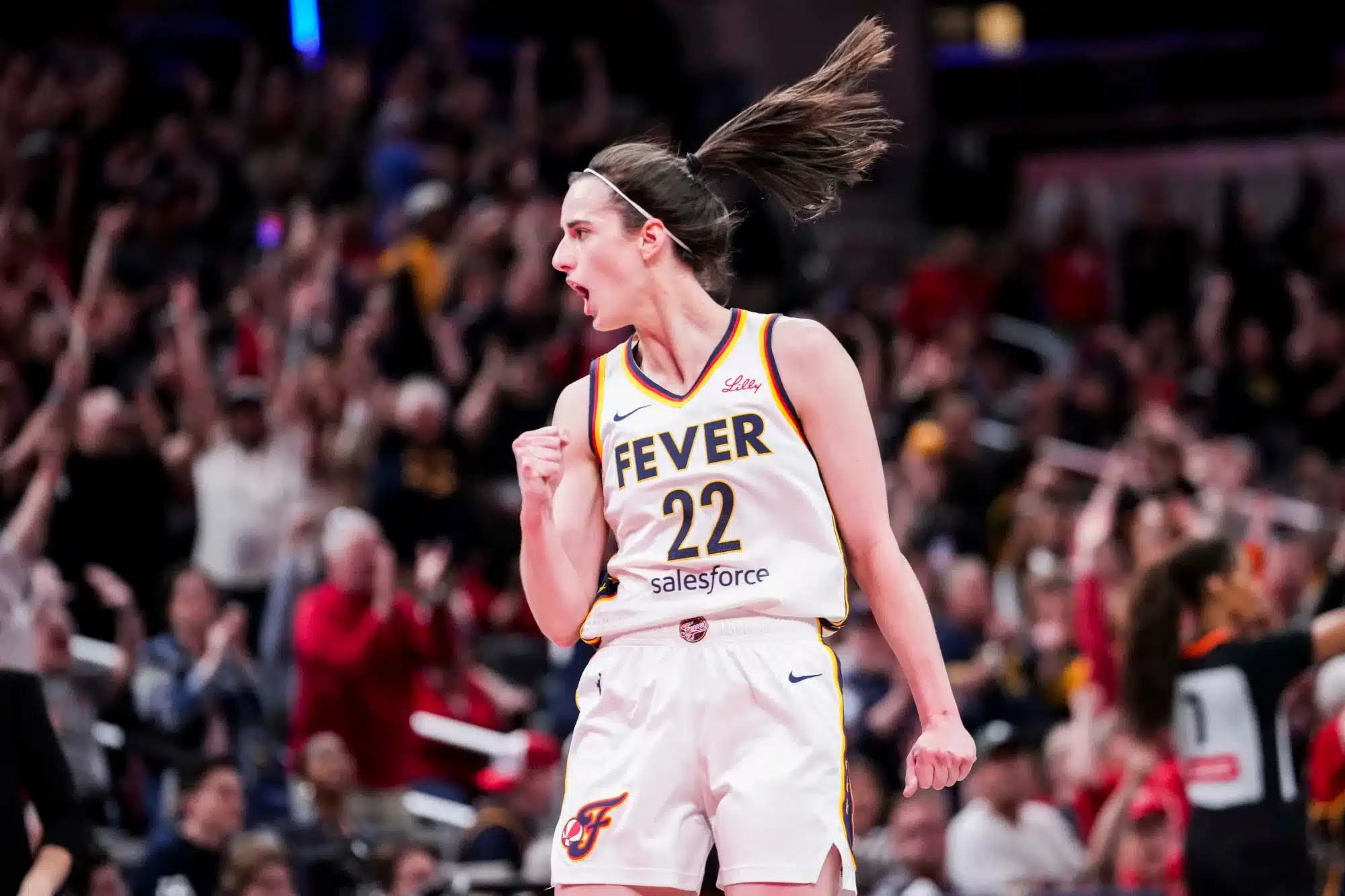 Indiana Fever guard Caitlin Clark (22) celebrates Saturday, May 24, 2025, during a game between the Indiana Fever and the New York Liberty at Gainbridge Fieldhouse in Indianapolis. The New York Liberty defeated the Indiana Fever, 90-88.