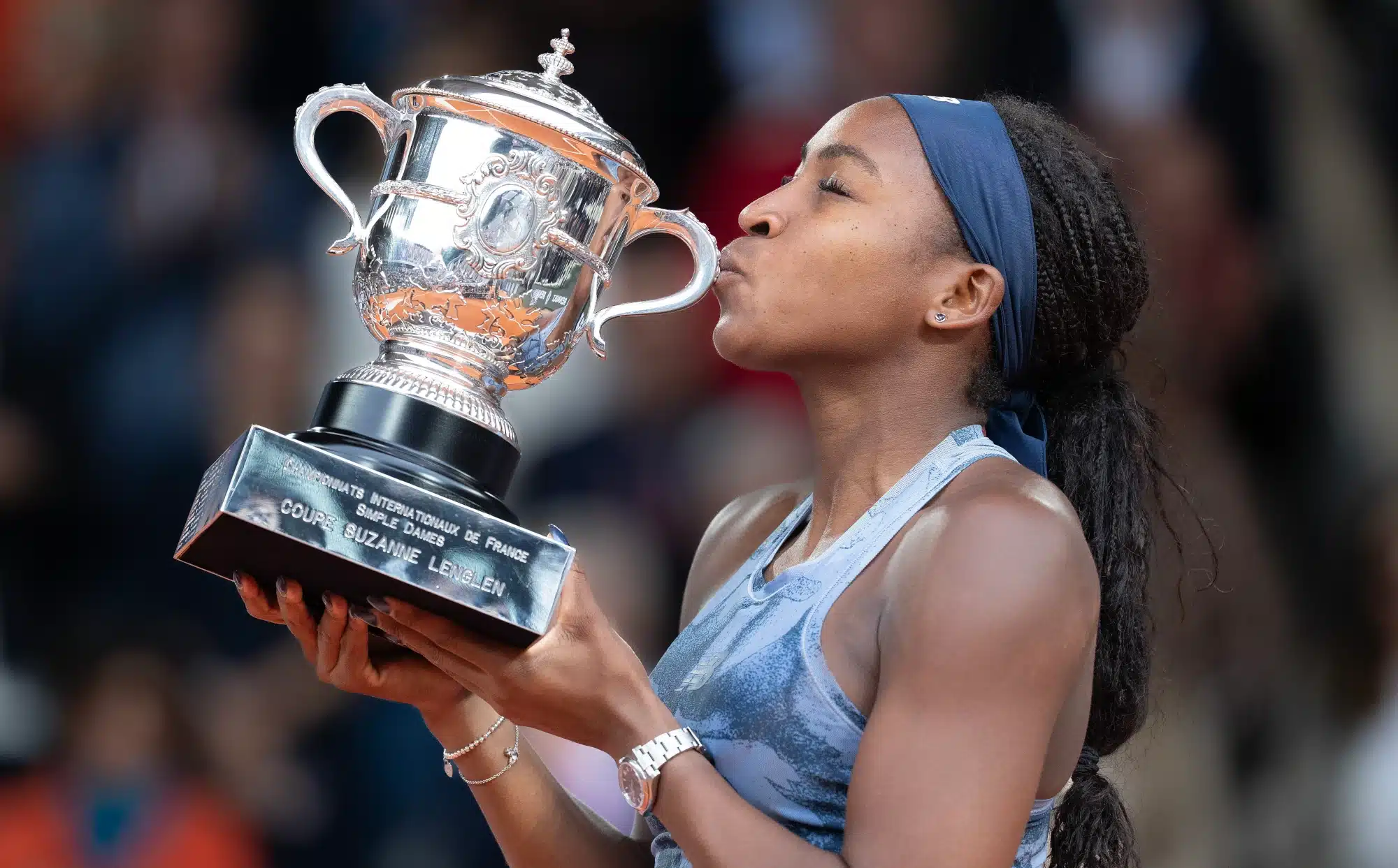 Jun 7, 2025; Paris, FR; Coco Gauff of the United States kisses the trophy after winning the womenís singles final against Aryna Sabalenka on day 14 at Roland Garros Stadium.