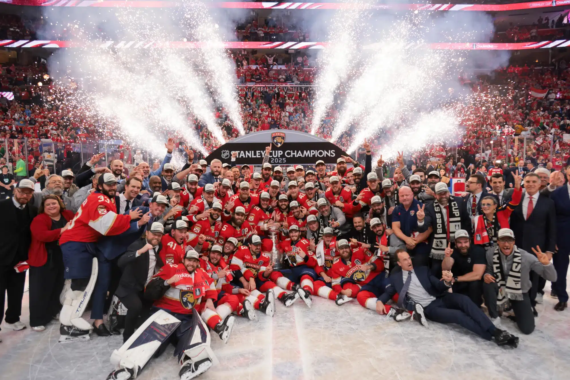 Jun 17, 2025; Sunrise, Florida, USA; The Florida Panthers pose for a photo with the Stanley Cup after winning game six of the 2025 Stanley Cup Final against the Edmonton Oilers at Amerant Bank Arena.