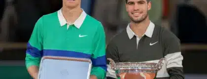 Jun 8, 2025; Paris, FR; Jannik Sinner of Italy and Carlos Alcaraz of Spain pose together at the trophy presentation after the men’s singles final on day 15 at Roland Garros Stadium.