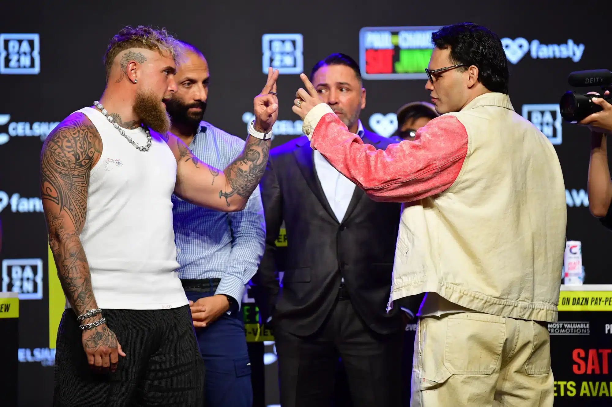 May 14, 2025; Los Angeles, California, USA; Jake Paul and Julio Cesar Chavez Jr. pose for photos in anticipation of their fight at Avalon Hollywood Theater.