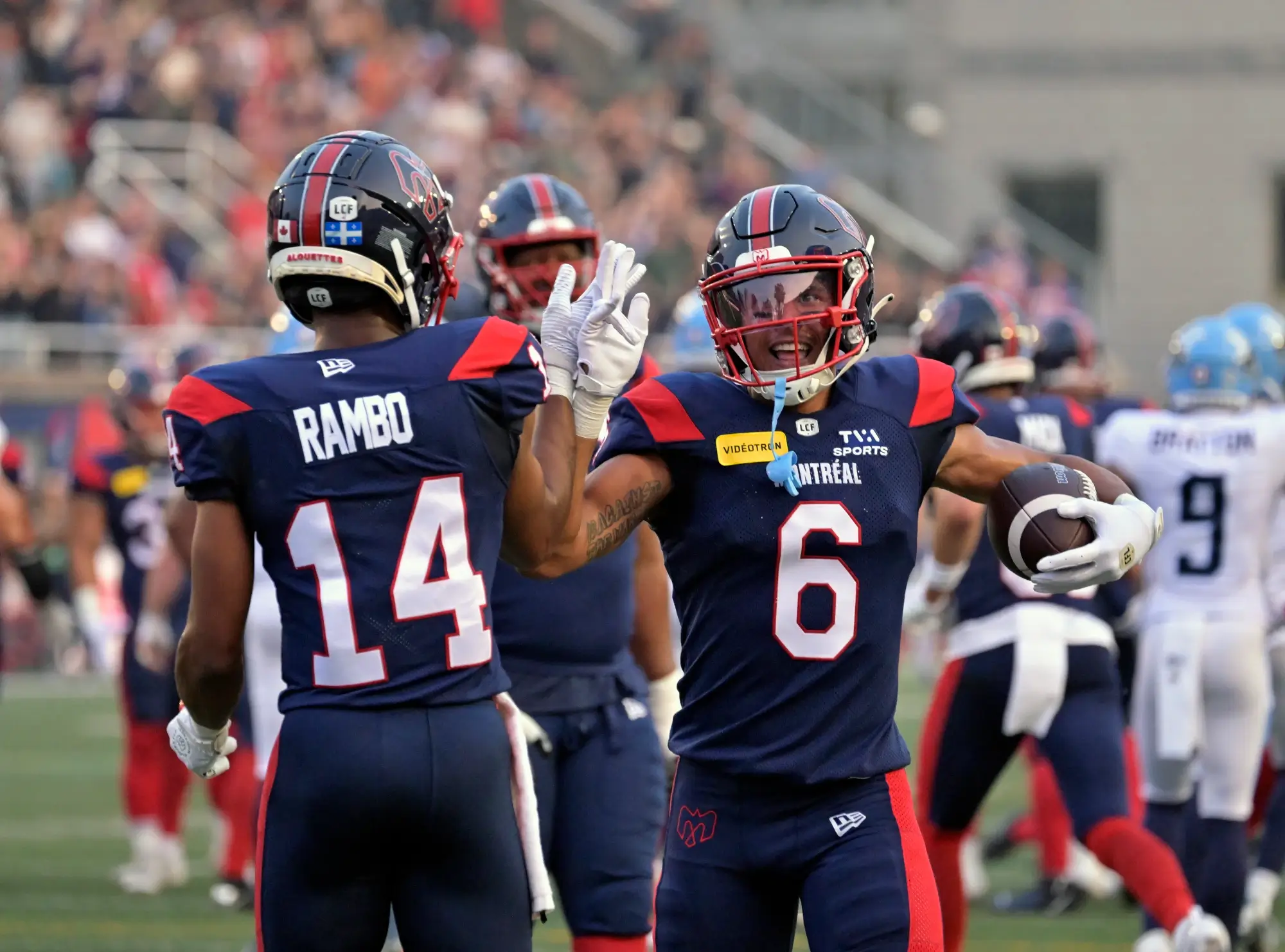 Jun 6, 2025; Montreal, Quebec, Canada; Montreal Alouettes wide receiver Tyson Philpot (6) celebrates with teammate wide receiver Charleston Rambo (14) after scoring a touchdown against the Toronto Argonauts during the first half at Percival-Molson stadium. Jun 6, 2025; Montreal, Quebec, Canada; Montreal Alouettes wide receiver Tyson Philpot (6) celebrates with teammate wide receiver Charleston Rambo (14) after scoring a touchdown against the Toronto Argonauts during the first half at Percival-Molson stadium.