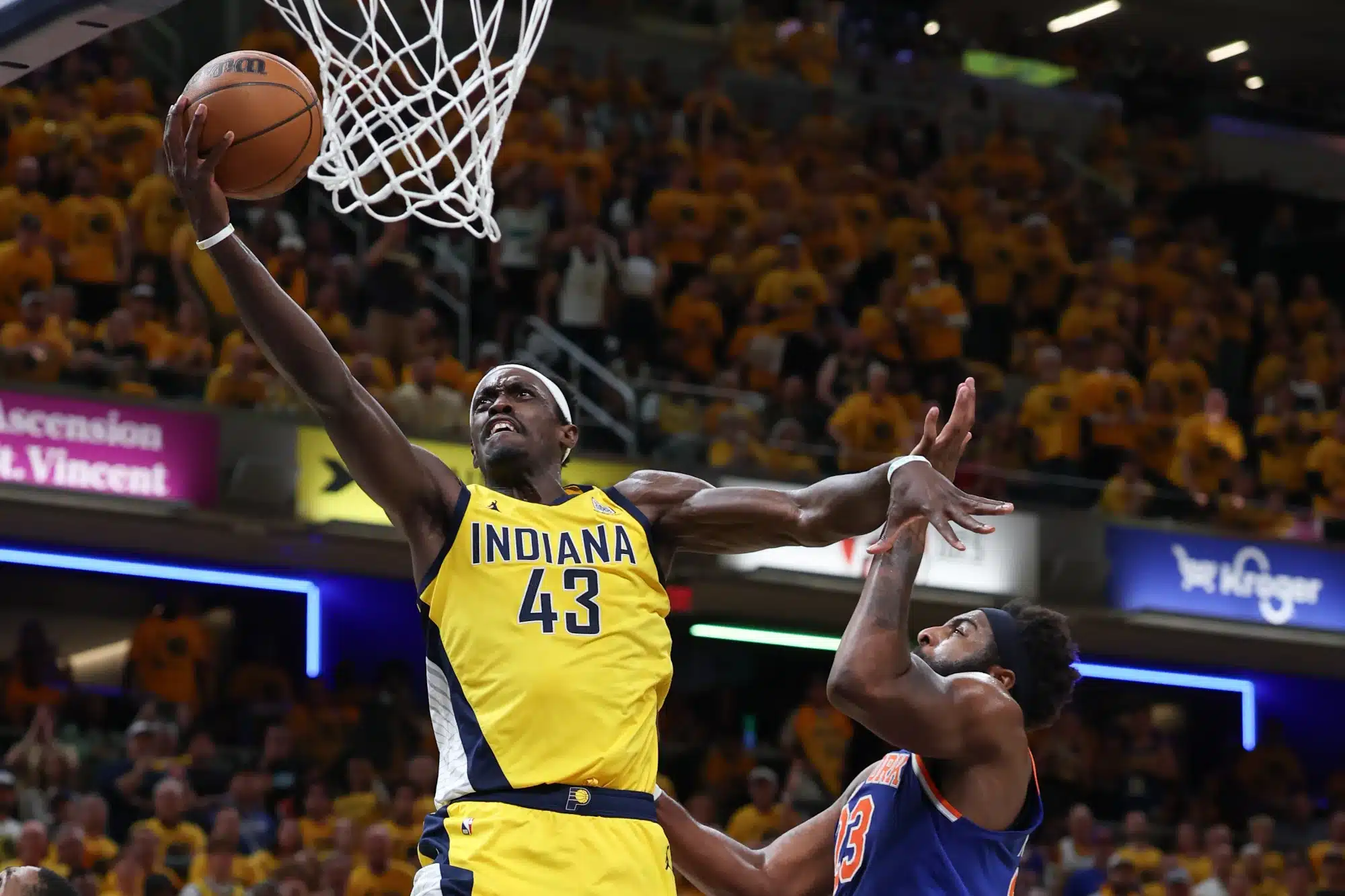 May 31, 2025; Indianapolis, Indiana, USA; Indiana Pacers forward Pascal Siakam (43) shoots the ball against New York Knicks center Mitchell Robinson (23) in the second quarterduring game six of the eastern conference finals for the 2025 NBA Playoffs at Gainbridge Fieldhouse.