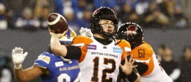 BC Lions quarterback Nathan Rourke (12) throws against the Winnipeg Blue Bombers in the first half at Investors Group Field