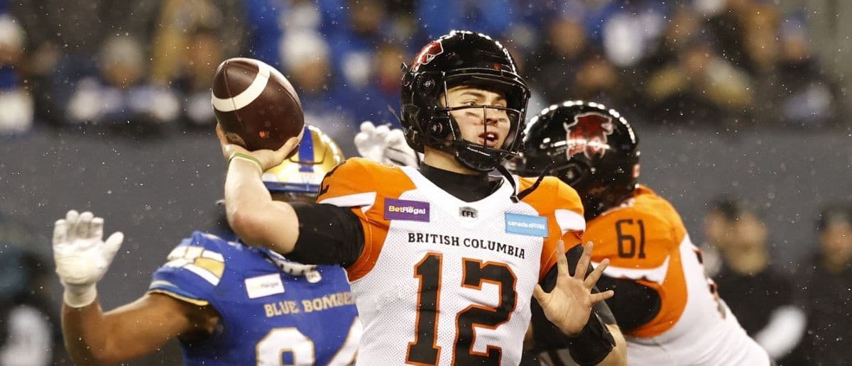 BC Lions quarterback Nathan Rourke (12) throws against the Winnipeg Blue Bombers in the first half at Investors Group Field
