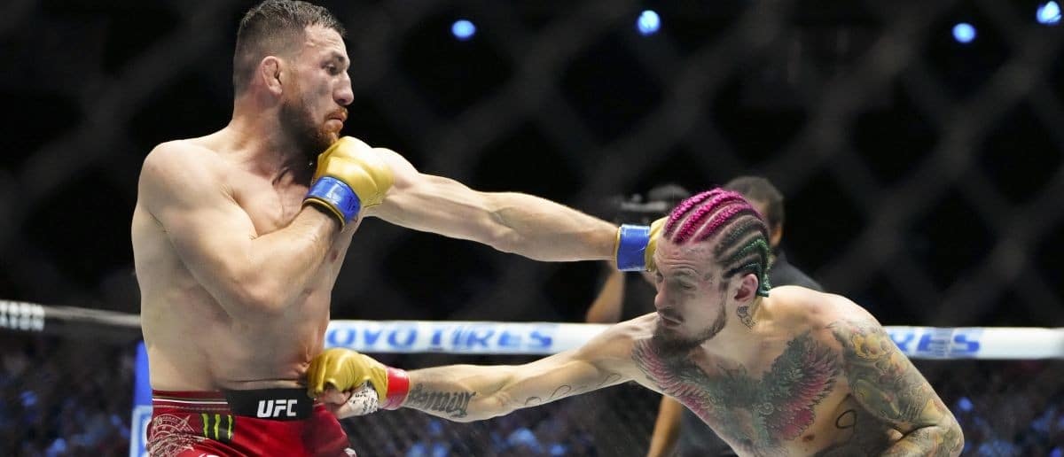 Sean OíMalley of the United States (red gloves) fights Merab Dvalishvili of Georgia (blue gloves) during Riyadh Season Noche UFC 306 at The Sphere.