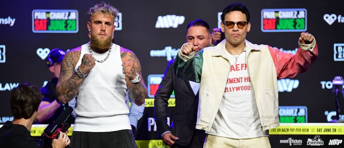 Jake Paul and Julio Cesar Chavez Jr. pose for photos following their press conference at Avalon Hollywood Theater.