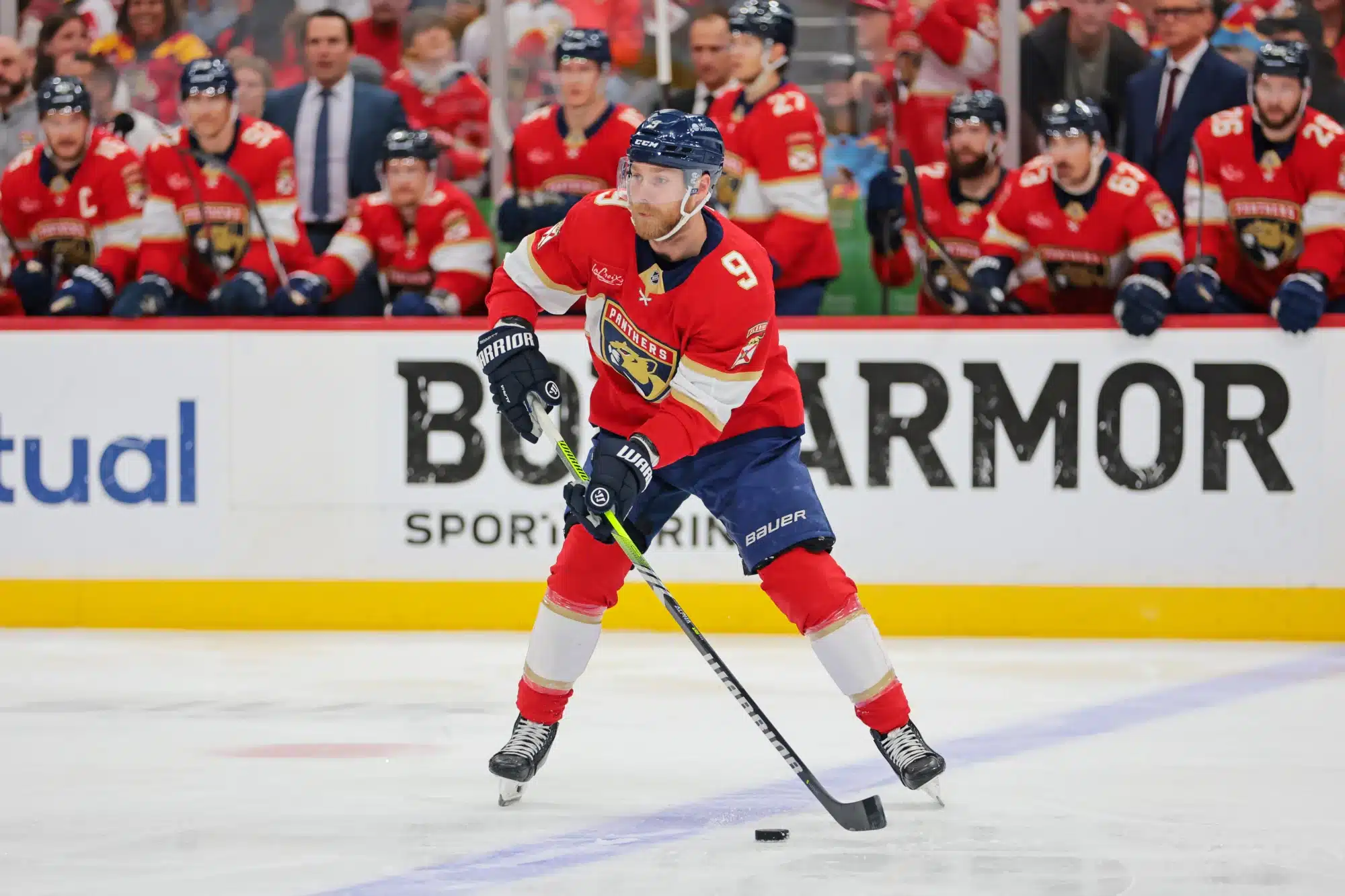 May 26, 2025; Sunrise, Florida, USA; Florida Panthers center Sam Bennett (9) controls the puck during the first period against the Carolina Hurricanes in game four of the Eastern Conference Final of the 2025 Stanley Cup Playoffs at Amerant Bank Arena.