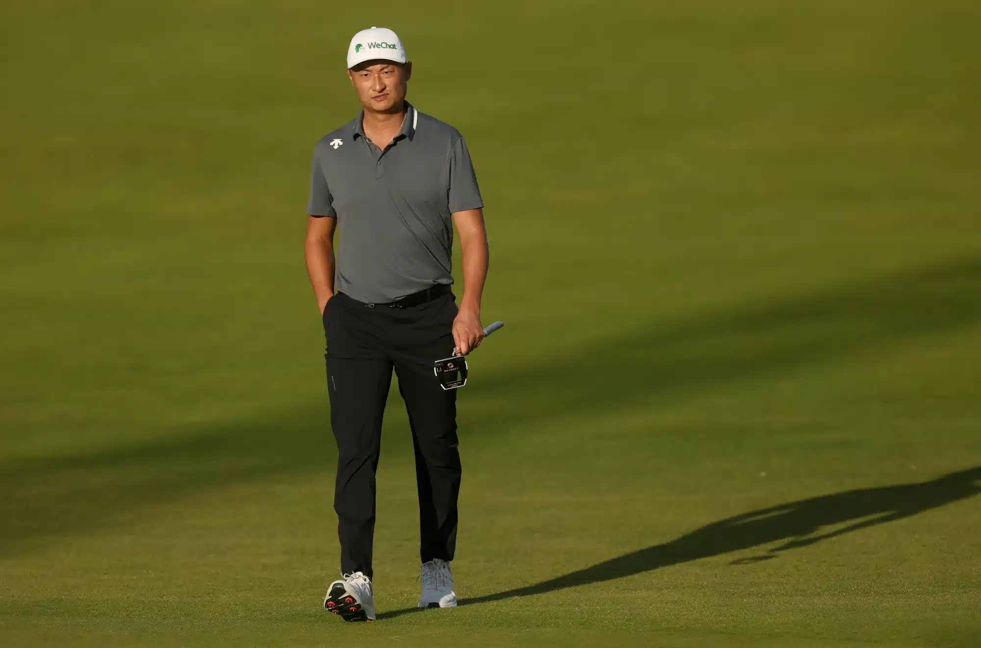 Jul 19, 2025; Portrush, IRL; Haotong Li on the 18th hole during the third round of The 153rd Open Championship golf tournament.