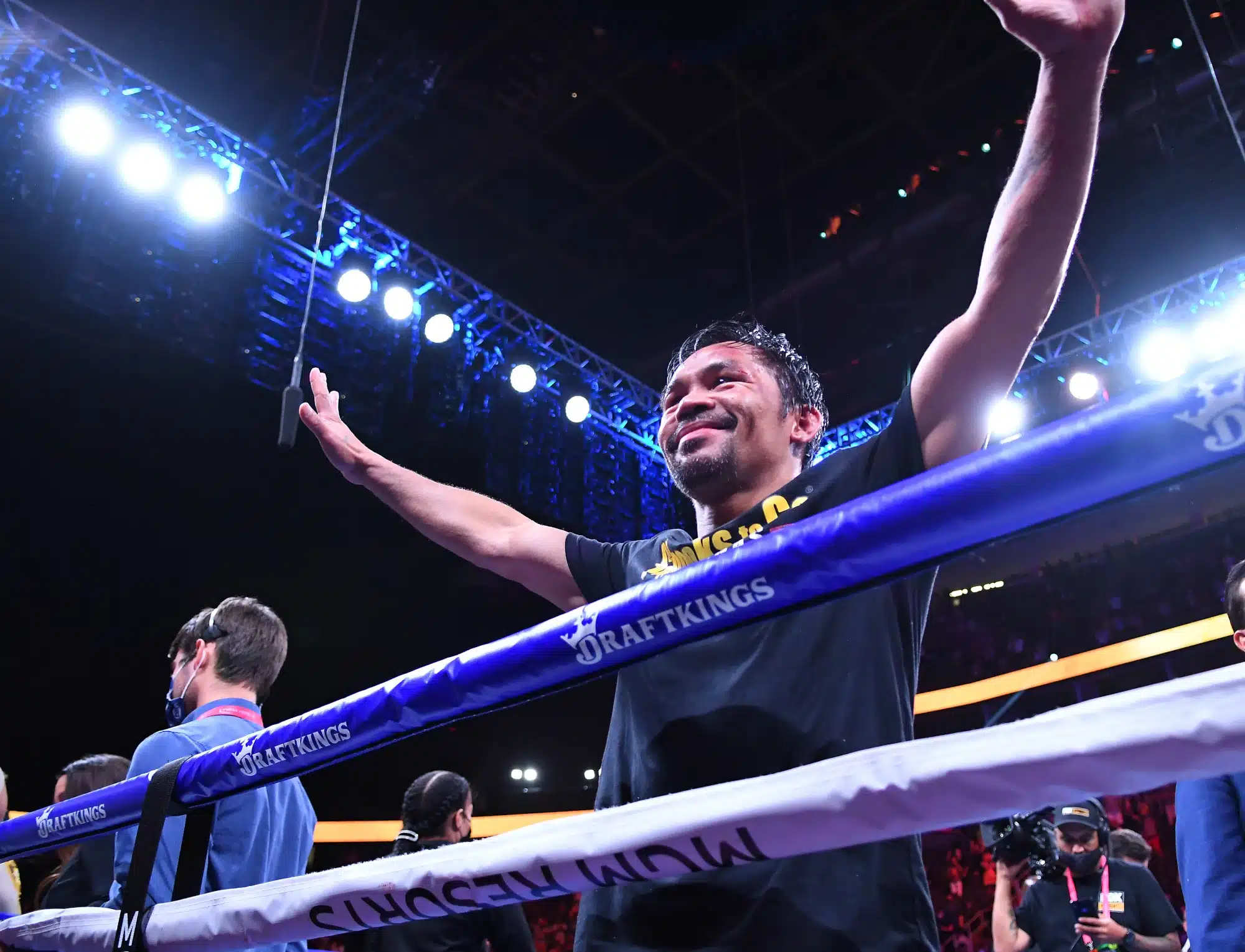Manny Pacquiao waves to fans after losing in a world welterweight championship bout in a decision to Yordenis Ugas at T-Mobile Arena.