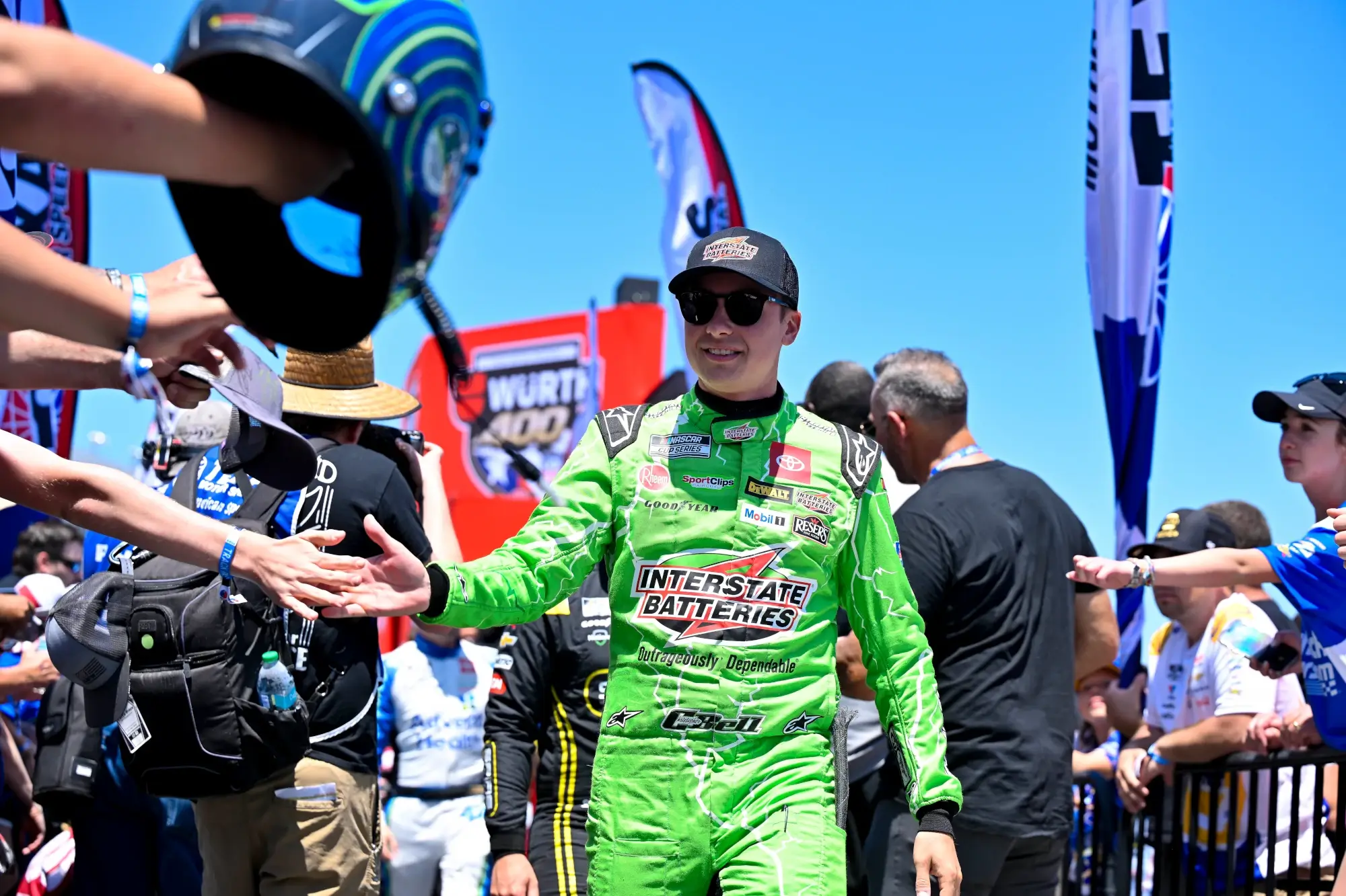 May 4, 2025; Fort Worth, Texas, USA; NASCAR Cup Series driver Christopher Bell (20) is introduced before the start of the Wurth 400 race at Texas Motor Speedway.