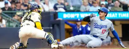 Jul 8, 2025; Milwaukee, Wisconsin, USA; Los Angeles Dodgers designated hitter Shohei Ohtani (17) is tagged out by Milwaukee Brewers catcher William Contreras (24) during the sixth inning at American Family Field.