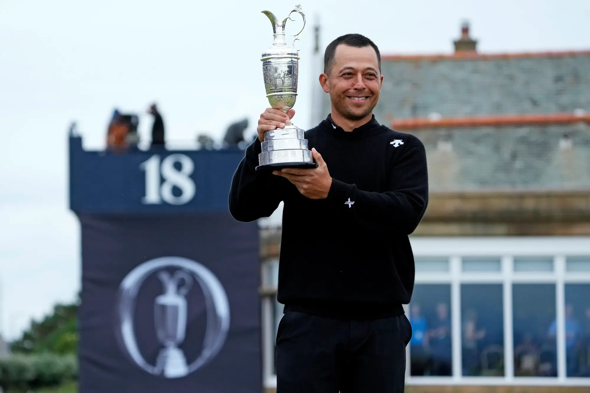 Jul 21, 2024; Ayrshire, SCT; Xander Schauffele celebrates with Claret Jug after winning the Open Championship golf tournament at Royal Troon.