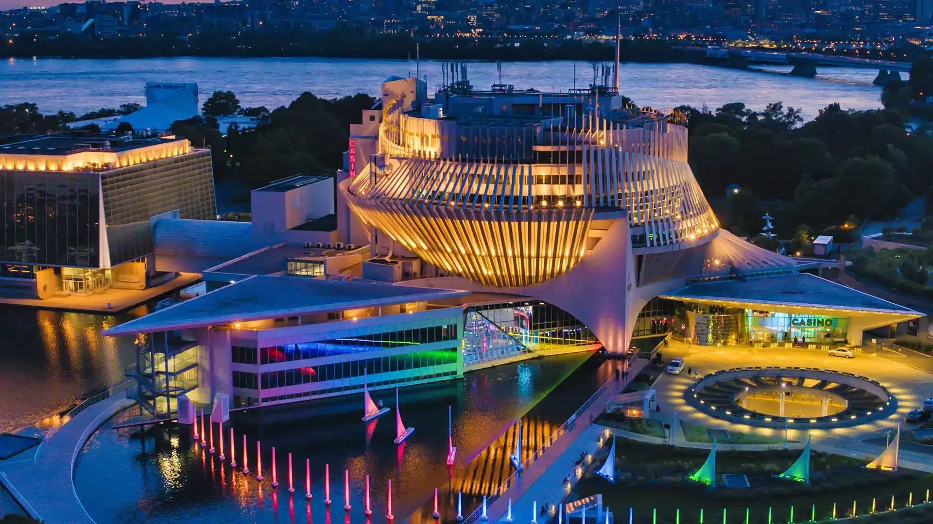 An arial view of the Casino de Montreal lit up at night.