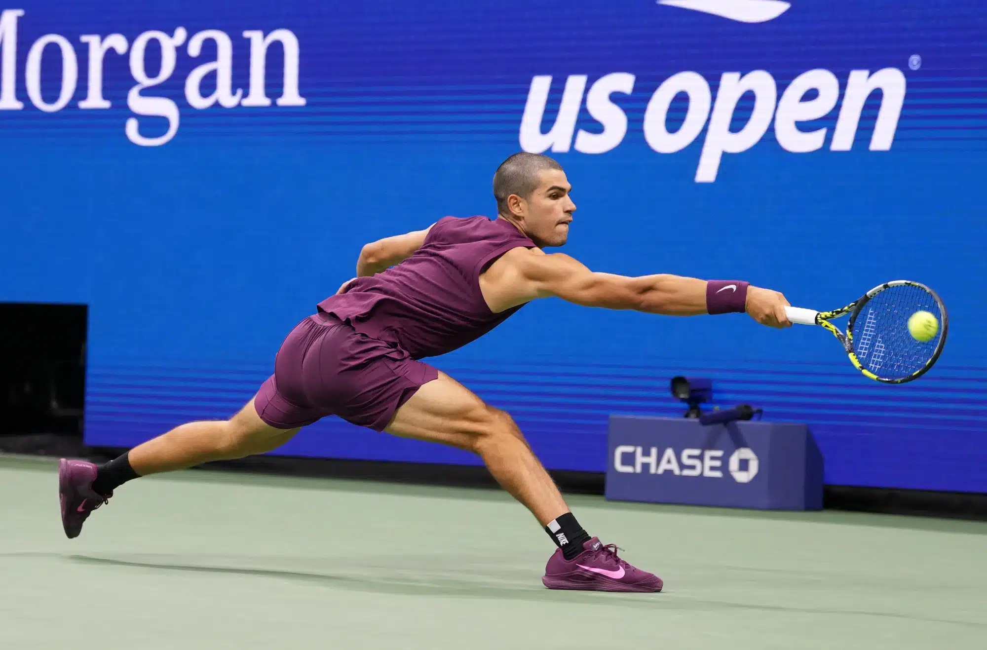Aug 27, 2025; Flushing, NY, USA; Carlos Alcaraz (ESP) hits to Mattia Bellucci (ITA) (not pictured) on day four of the 2025 U.S. Open tennis tournament at the USTA Billie Jean King National Tennis Center. 