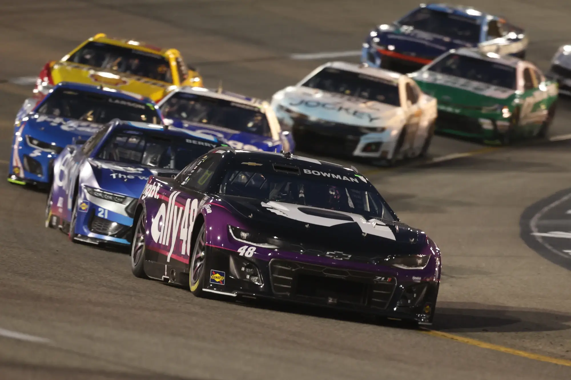 Aug 16, 2025; Richmond, Virginia, USA; NASCAR Cup Series driver Alex Bowman (48) leads a pack of cars during the NASCAR Cup Series Cook Out 400 at Richmond Raceway.