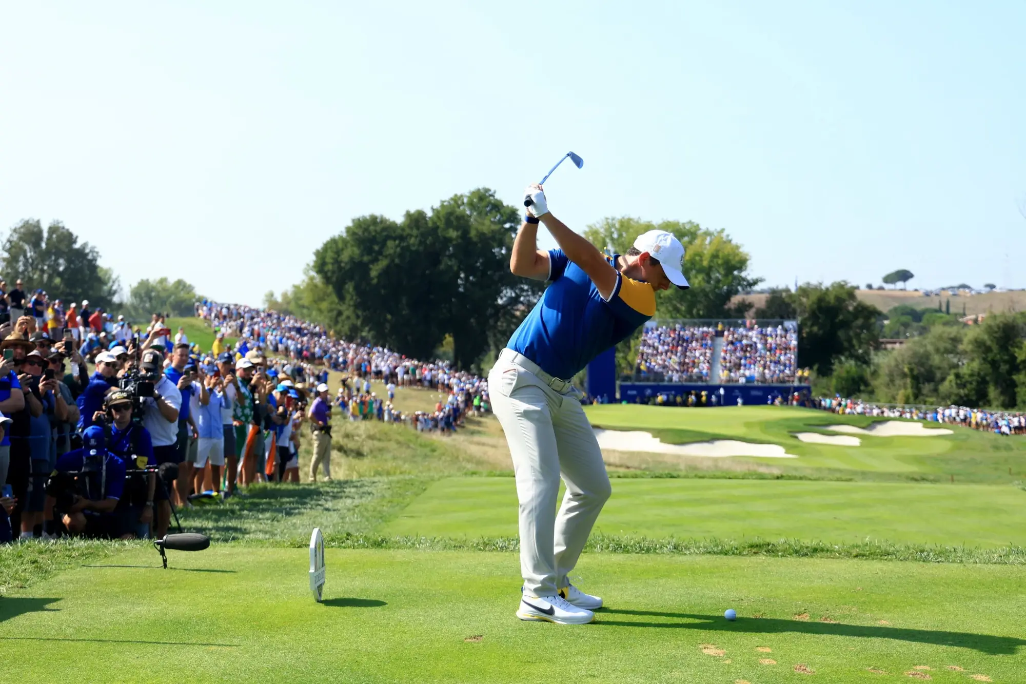 Rory McIlroy of Team Europe tees off on the fourth hole during the Sunday singles matches of the 2023 Ryder Cup at Marco Simone Golf Club on October 01, 2023 in Rome, Italy.
