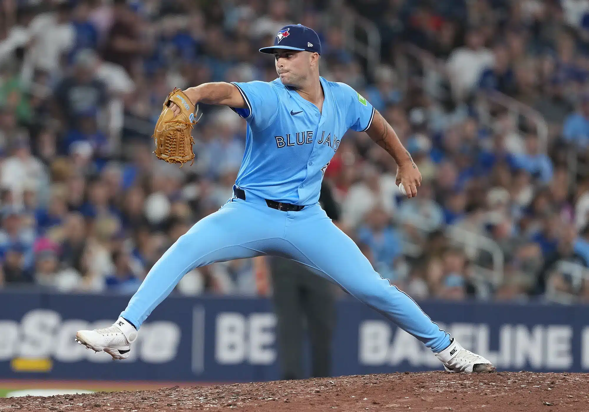 Aug 12, 2025; Toronto, Ontario, CAN; Toronto Blue Jays relief pitcher Mason Fluharty (68) throws a pitch against the Chicago Cubs during the sixth at Rogers Centre.