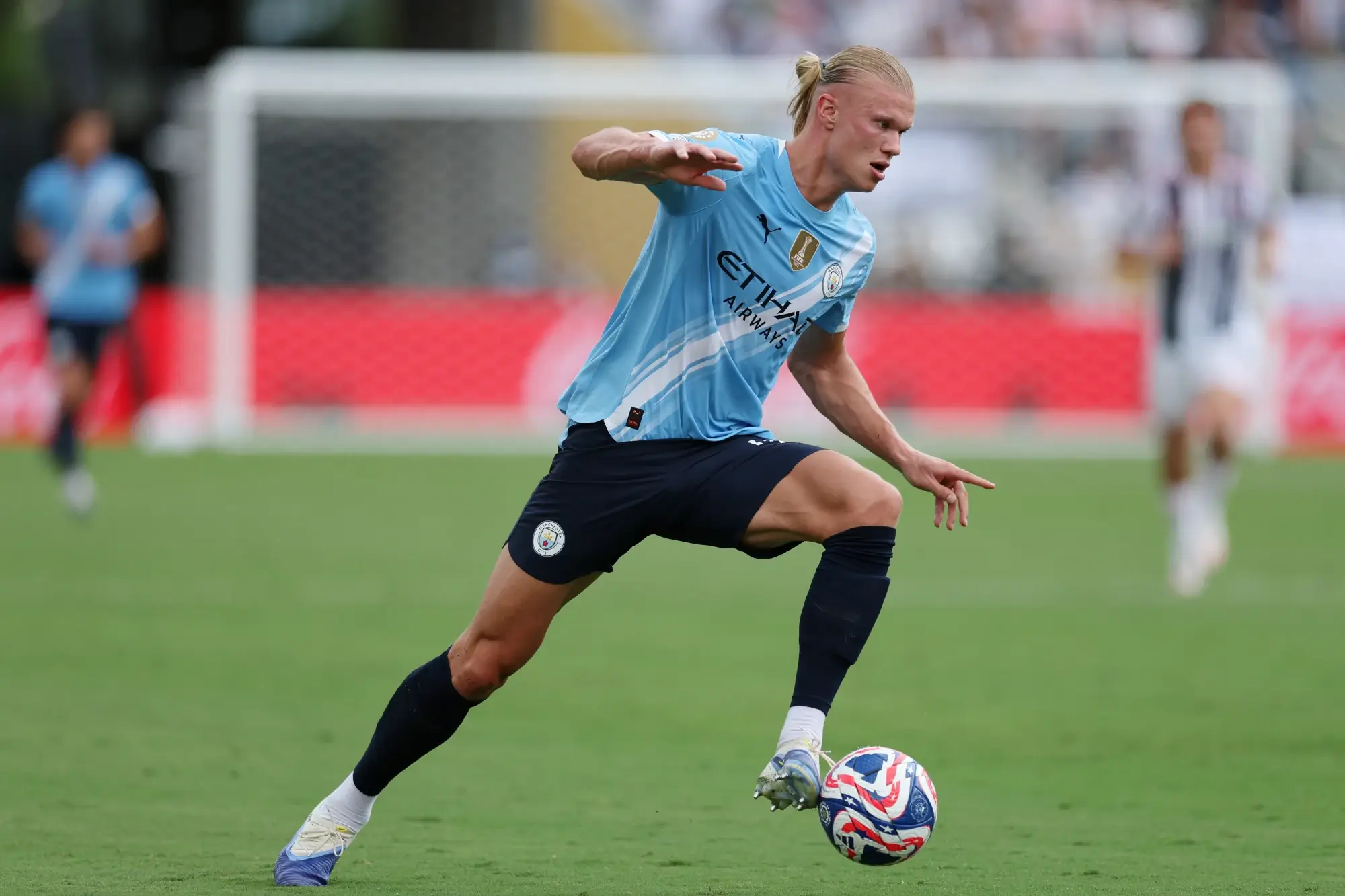 Jun 26, 2025; Orlando, Florida, USA; Manchester City forward Erling Haaland (9) controls the ball against Juventus FC during the second half during a group stage match of the 2025 FIFA Club World Cup at Camping World Stadium.