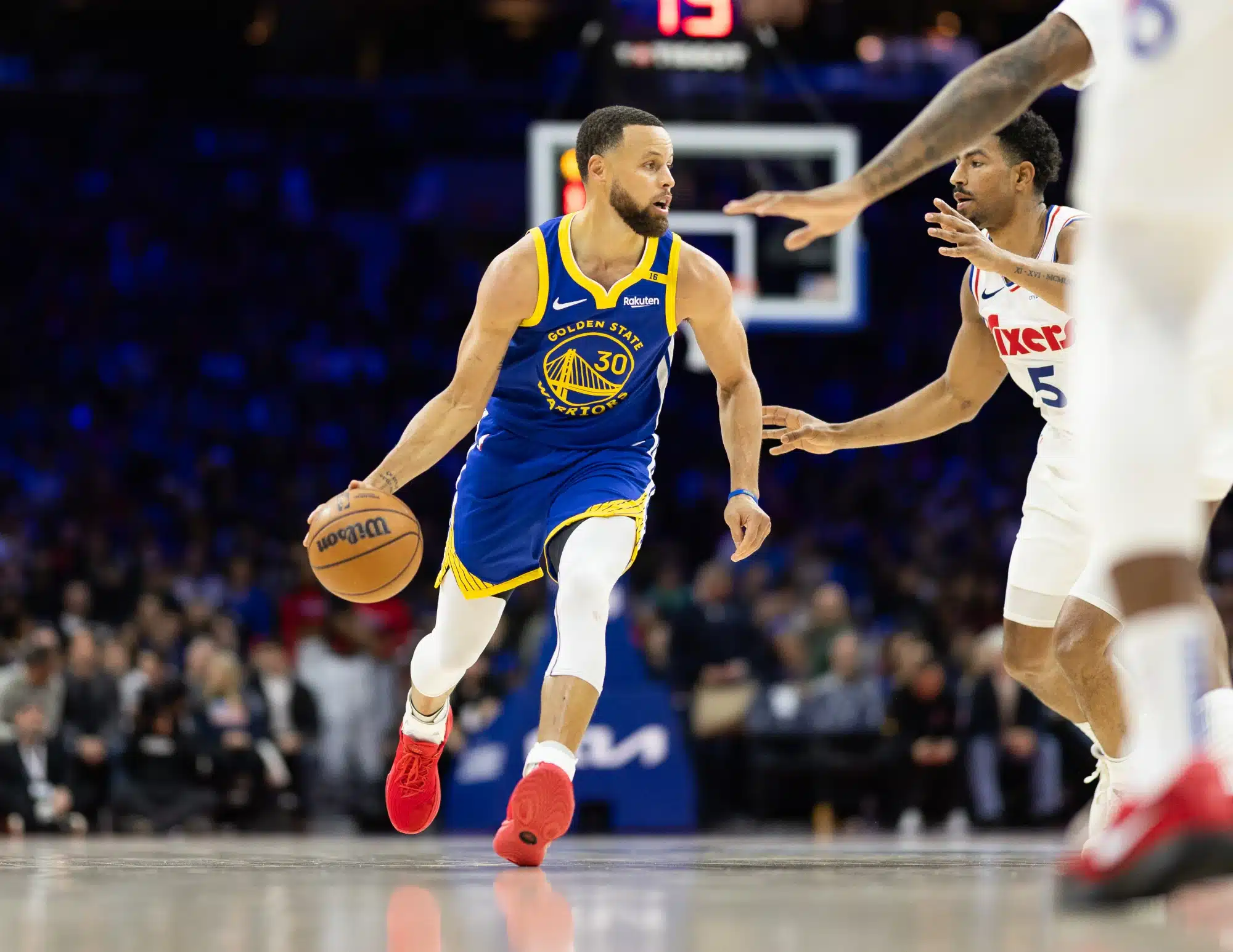 Mar 1, 2025; Philadelphia, Pennsylvania, USA; Golden State Warriors guard Stephen Curry (30) dribbles the ball against the Philadelphia 76ers during the third quarter at Wells Fargo Center. 